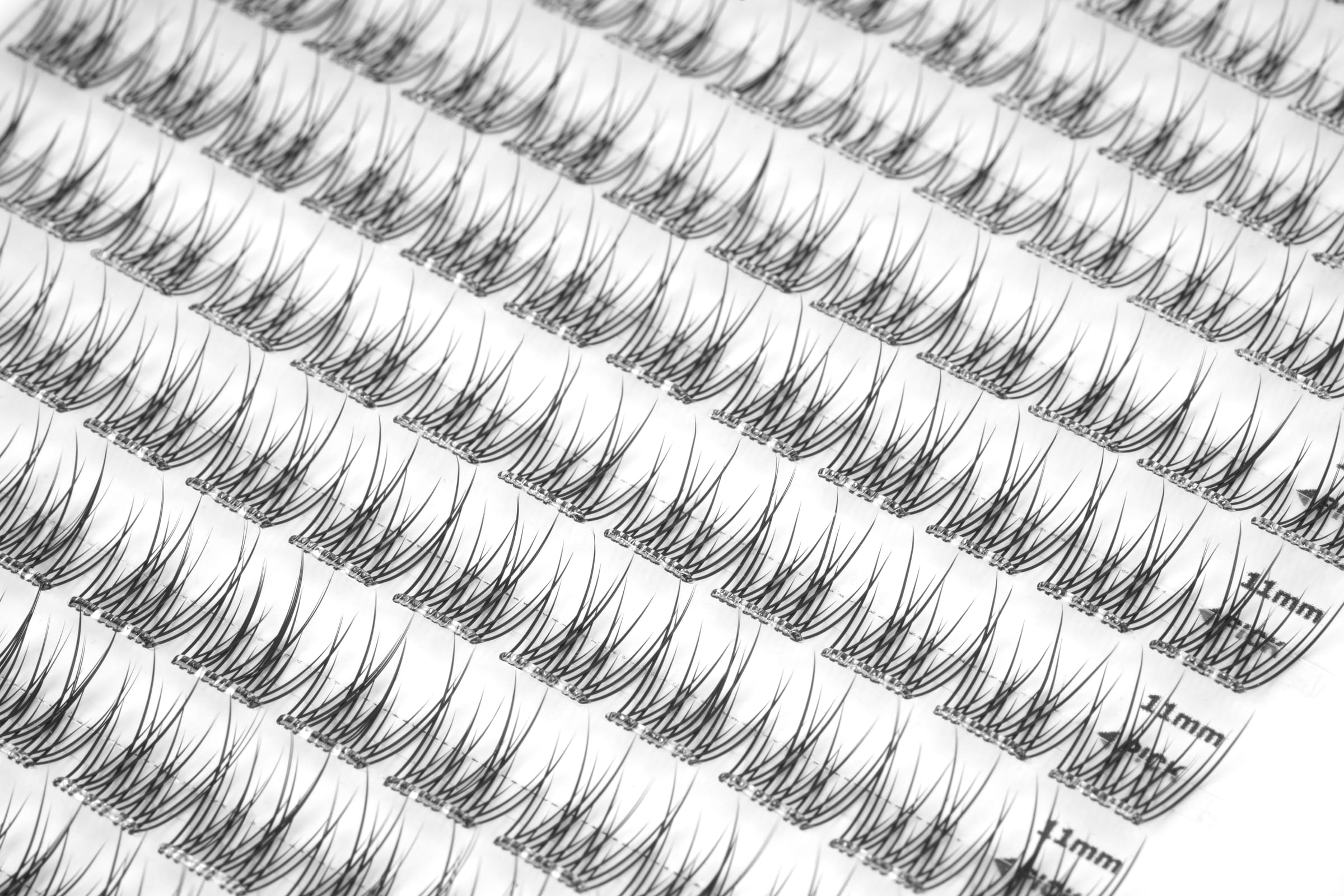 Real production trays with repeated DIY lash segments
