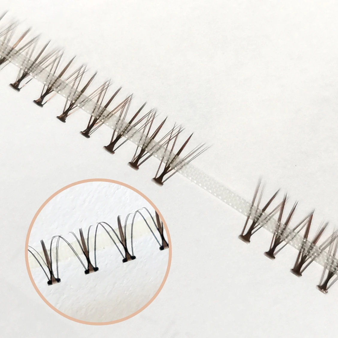 Supplied original photograph of brown flower DIY lash clusters with a detail inset